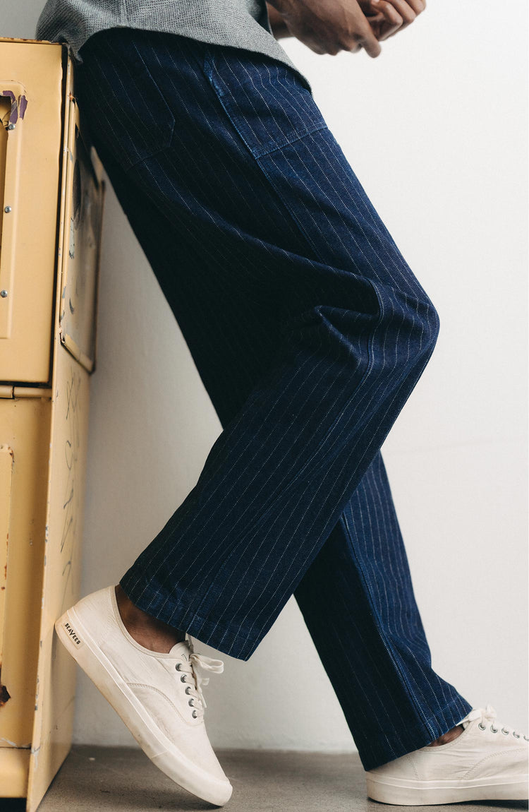 fit model posing in The Mariner Jean in Rinsed Indigo Dobby Denim