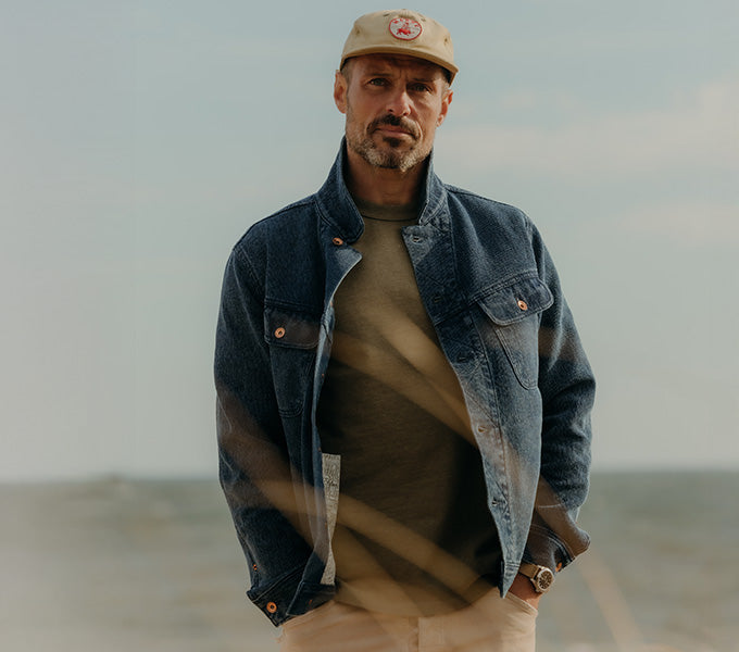 Model wearing The Long Haul jacket in Rinsed Indigo Waffle